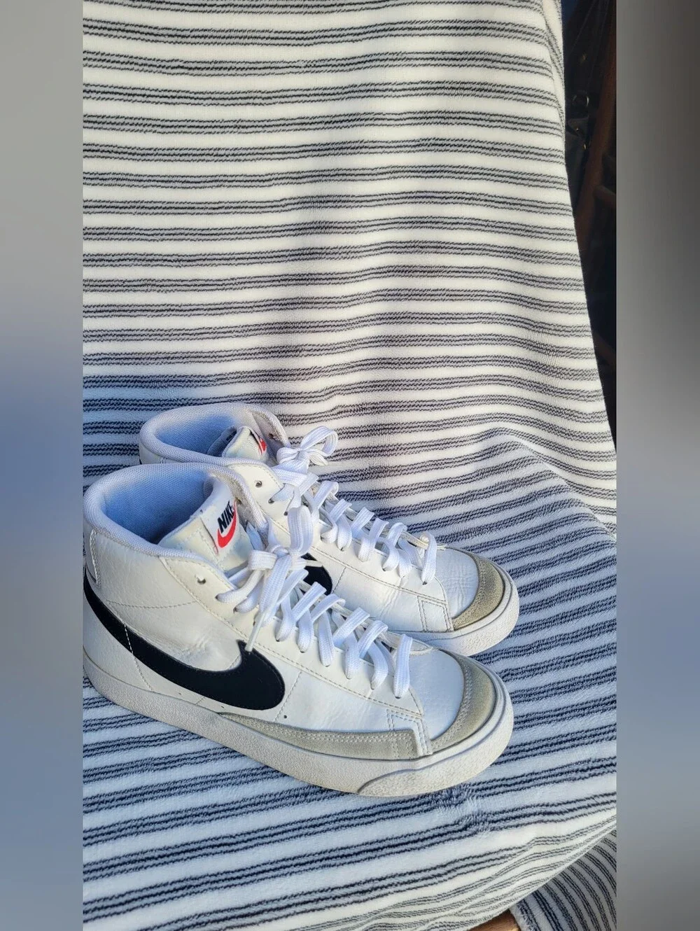 Nike White High-Top Blazers Sneakers with Black Swoosh and Red Tongue Tag